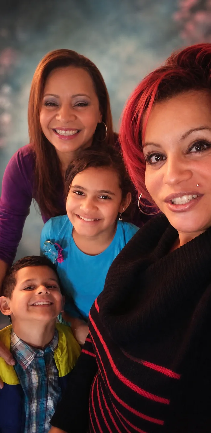 A family smiling together.