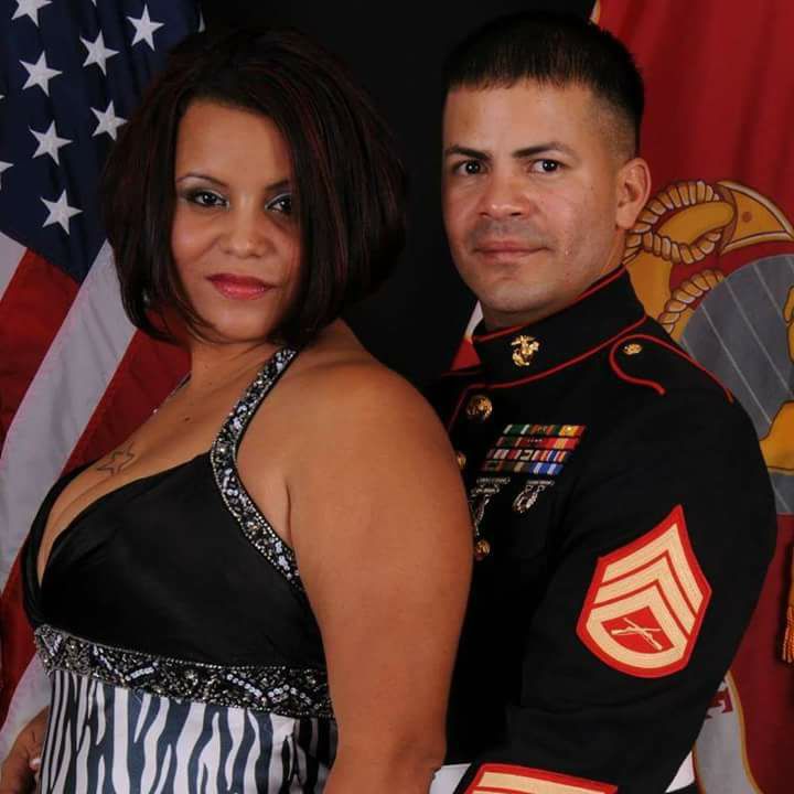 Layssa Ivette Jimenez with her husband at a formal Marine Corps event